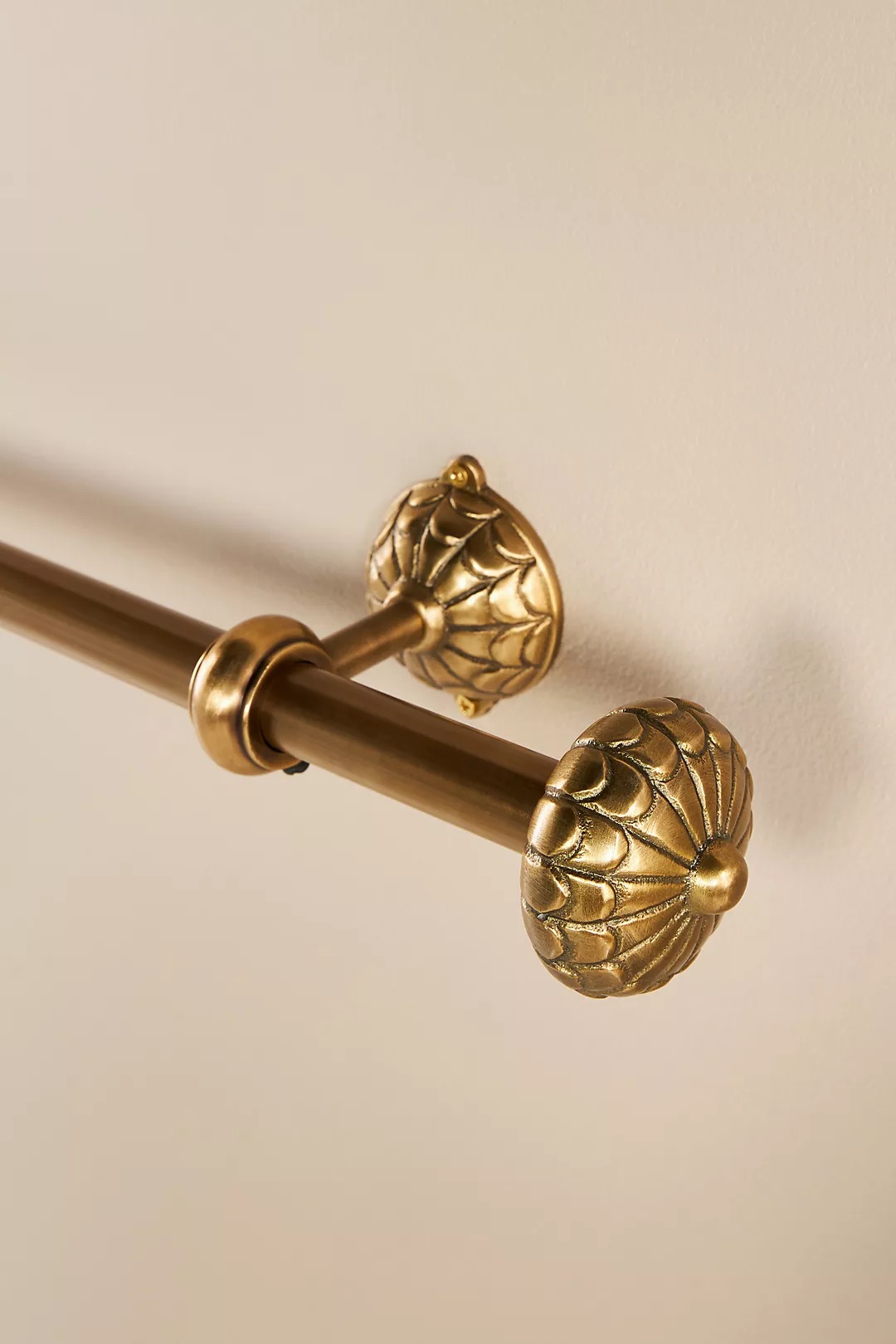 Decorative finial cap for the end of a curtain rod